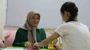 Koruyucu aile Ayşe'yi, özel gereksinimlerine rağmen asla geri vermeyi düşünmüyorlar