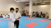 Çocuk Evleri Sitesi’nde kalan sporcu Muhammed Ali kuşak sınavını başarıyla geçti