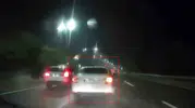 Elazığ'da sağanak yağışa aldırmadı: Trafiği birbirine katan sürücü kamerada