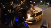 Kask kamerası kazayı böyle kaydetti: Otomobilin üzerine savruldular, mucize eseri kurtuldular