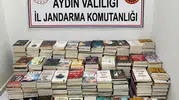 Kuşadası Gece Pazarı'nda korsan kitap operasyonu: Yüzlerce eser toplandı