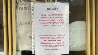 Apartman Kapısına Yapıştırılan İlginç Yazı Dikkat Çekti