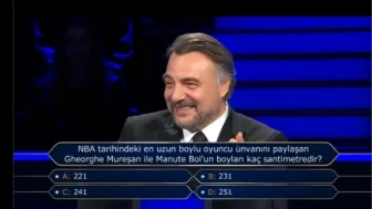 NBA tarihindeki en uzun boylu oyuncu ünvanını paylaşan Gheorghe Mureşan ile Manute Bol'un boyları kaç santimetredir?