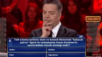 Türk sinema tarihinin dram ve komedi filmlerinde "babacan patron" figürü ile özdeşleşmiş Hulusi Kentmen'in oyunculuktan önceki mesleği nedir?