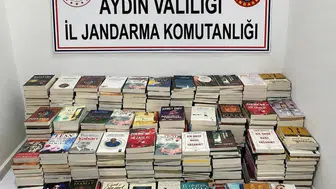 Kuşadası Gece Pazarı'nda korsan kitap operasyonu: Yüzlerce eser toplandı
