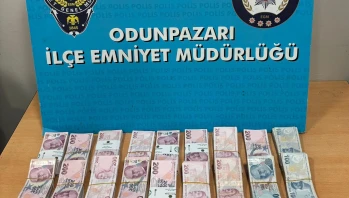 Odunpazarı’nda kendini polis olarak tanıtan dolandırıcı çantayla yakalandı