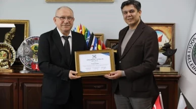 Başkan Durgut’a onursal üyelik plaketi takdim edildi