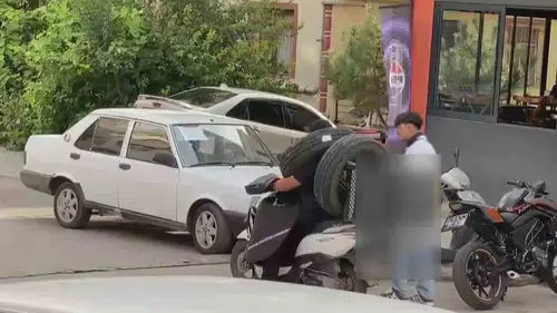 Ankara'da kuryenin lastik taşıma yöntemi görenleri hayrete düşürdü