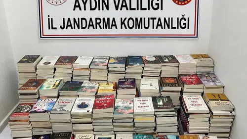 Kuşadası Gece Pazarı'nda korsan kitap operasyonu: Yüzlerce eser toplandı